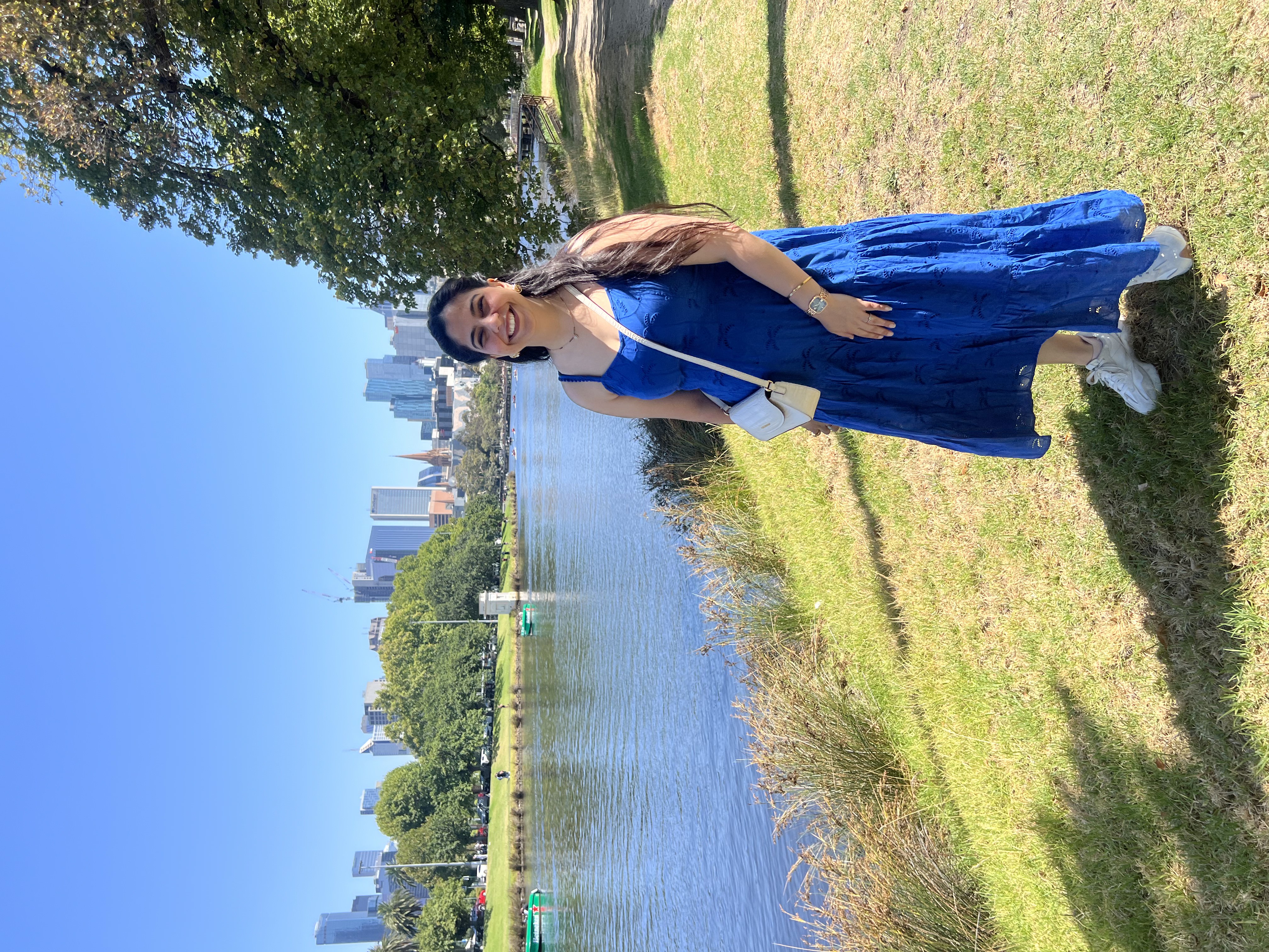 Ttanusha Dhawan standing by the Yarra River in Melbourne